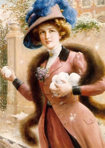 Элегантная дама играет в снежки